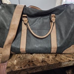 Overnight/Weekender faux leather travel bag.  Very roomy